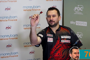VIDEO: Clayton throws darts from all sorts of different positions in challenge