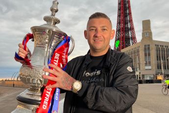 Iconic Blackpool Tower turns red in honor of defending champion Nathan Aspinall