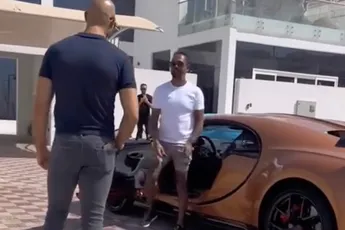/nieuws/andrew-tate-neemt-bugatti-chiron-met-nederlands-tintje-weer-in-ontvangst