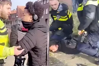 Knul op fatbike gaat de strijd aan met oom agent, eindigt schreeuwend op de grond