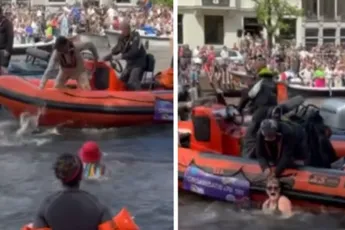 Amsterdam: Demonstranten springen in gracht tijdens Canal Gay Pride