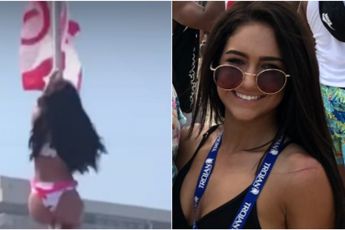 Bikinimeisje gaat aan vlaggenmast hangen, maar dan gaat het volledig mis (VIDEO)