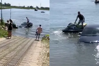 Auto te water in jachthaven van Wageningen: "Slepen slepen, niet filmen"
