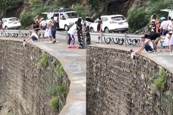 Chinese ouders genomineerd voor ouders van het jaar met levensgevaarlijk fotomomentje