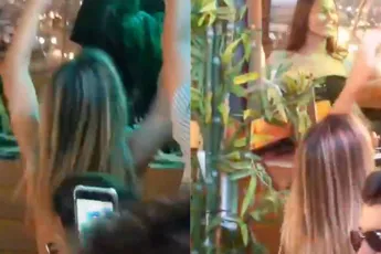 DJ heeft mooi uitzicht op schoonheid die voor hem staat