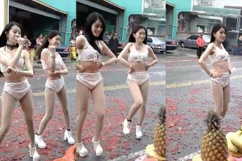 Ondertussen ergens in Azie: Dames doen een dansje op straat