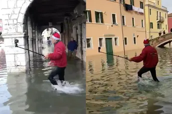 Toerist met selfie-stick haalt nat pak in overstroomd Venetië
