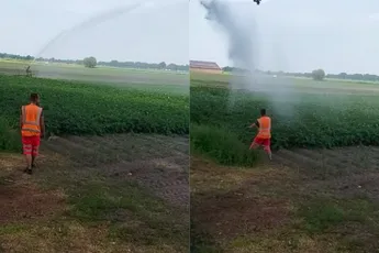 Vuilnisman wil afkoelen onder watersproeier