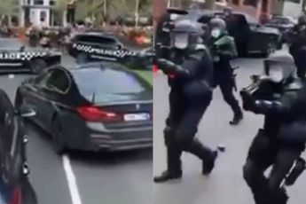 Actievoerders en politie gaan inmiddels hard tegen hard in het Australische Melbourne