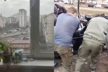 Ondertussen in Kiev: Russische tank rijdt over auto, maar Oekraïner kan het na vertellen