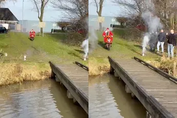 Ondertussen in Oude Pekela: Kerstman gaat op scooter het ijskoude water