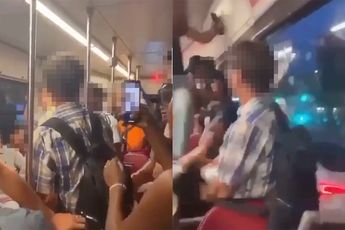 Gezelligheid in tram in Den Haag, want man wordt geschopt en geslagen door groep