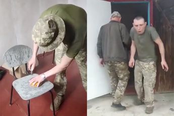 Oekraïense soldaten openen een potje Surströmming