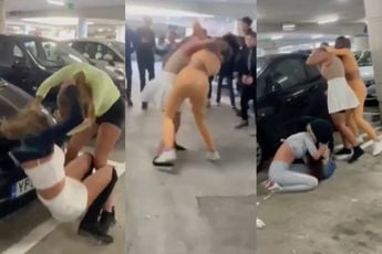 Catfight in de parkeergarage, iedereen met elkaar op de vuist