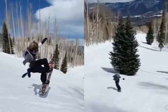 Snowboarder heeft ondervonden dat een dennenboom niet echt meegeeft