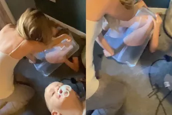 HOE DAN? Dochter vast in plastic doos