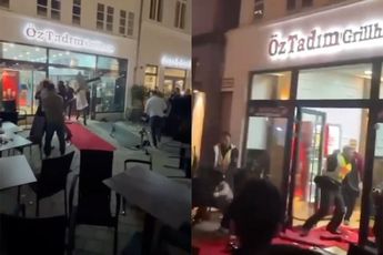 Ondertussen in het Duitse Oldenburg: Mensen gezellig met elkaar op de vuist bij kebabshop