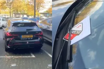 Met je Feyenoord-auto voor de FC Utrecht Fanshop parkeren, dan kun je een cadeautje verwachten