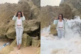 Poseren voor een vakantiekiekje valt toch wel in het water