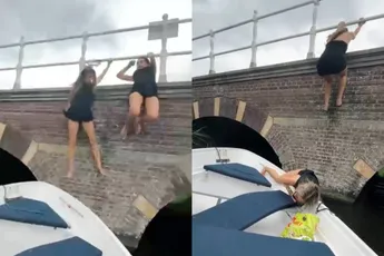 RUMAG-presentatrice Gwen en vriendinnetje hebben geheel eigen wijze om boot op te klimmen