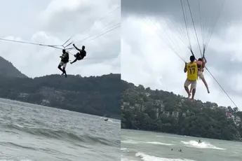 De parasailers op het Thaise Phuket houden wel van een beetje risico nemen tijdens hun werkzaamheden