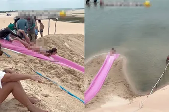 Brazilianen hebben een waterglijbaan gemaakt en een dame glijdt er keihard vanaf