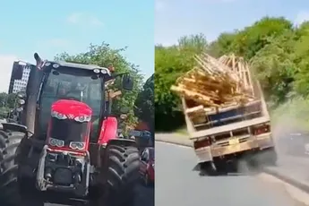 Boer Jack op zijn mooie rooie Massey Ferguson gooide pallets op de snelweg in Preston