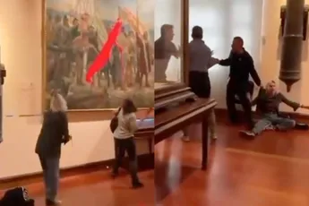 Klimaatgekkies van Futuro Vegetal gooien rode verf over schilderij van Columbus in Madrid