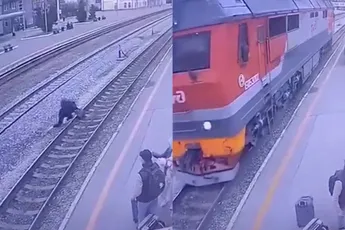 Rus komt onder de trein, maar kwam daar wonderbaarlijk goed mee weg