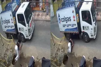 Colombiaanse moeder en baby door het spreekwoordelijk oog van de naald