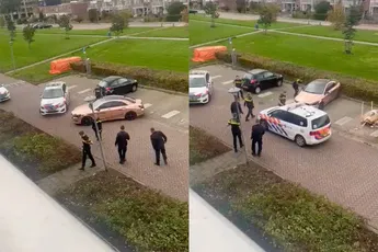 Sow, er zijn nogal wat agentjes nodig om één man uit zijn auto te krijgen