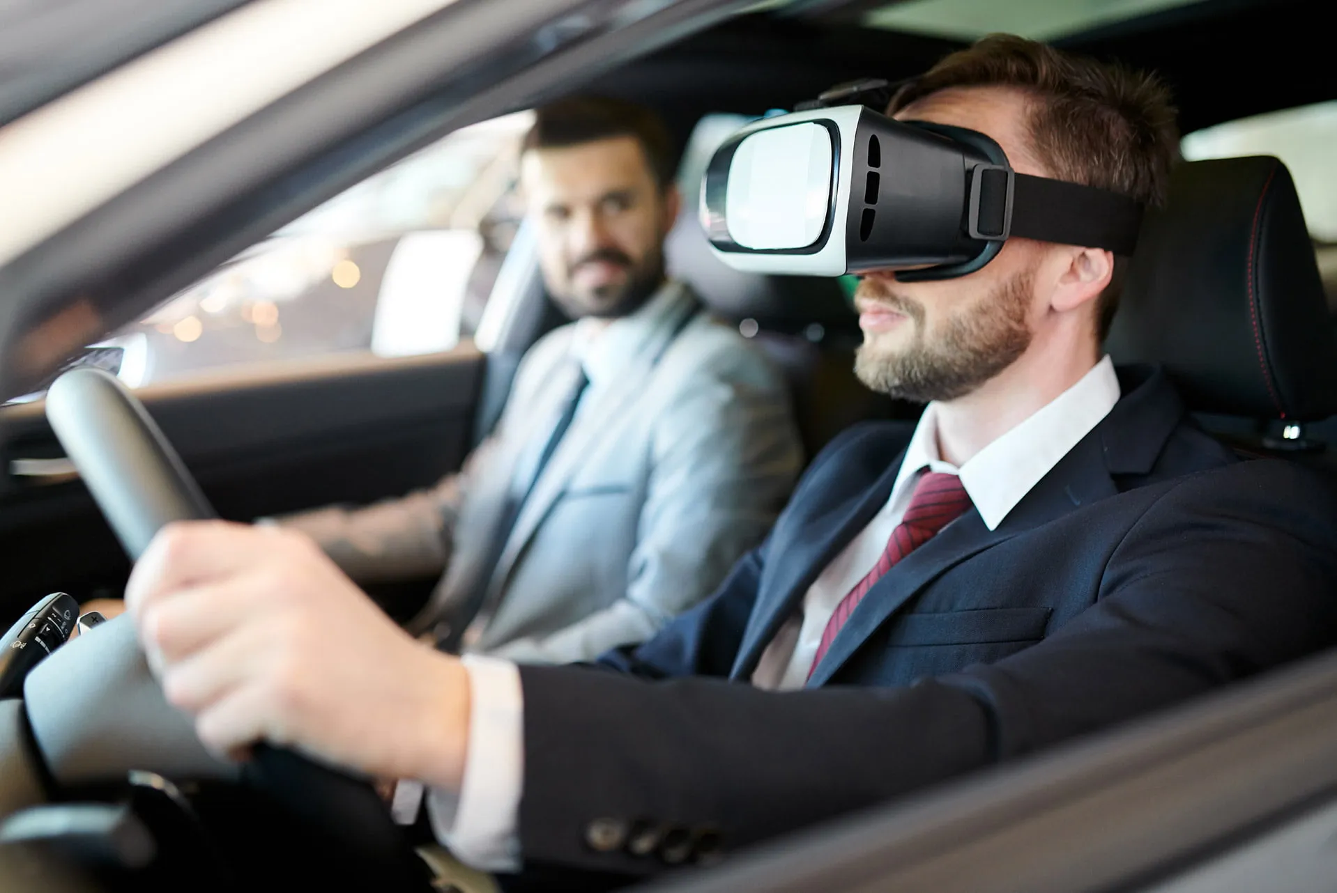 man driving in virtual reality headset 4hszr8v