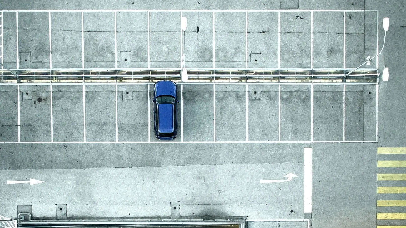 traffic law how long can you stand on a supermarket parking lot