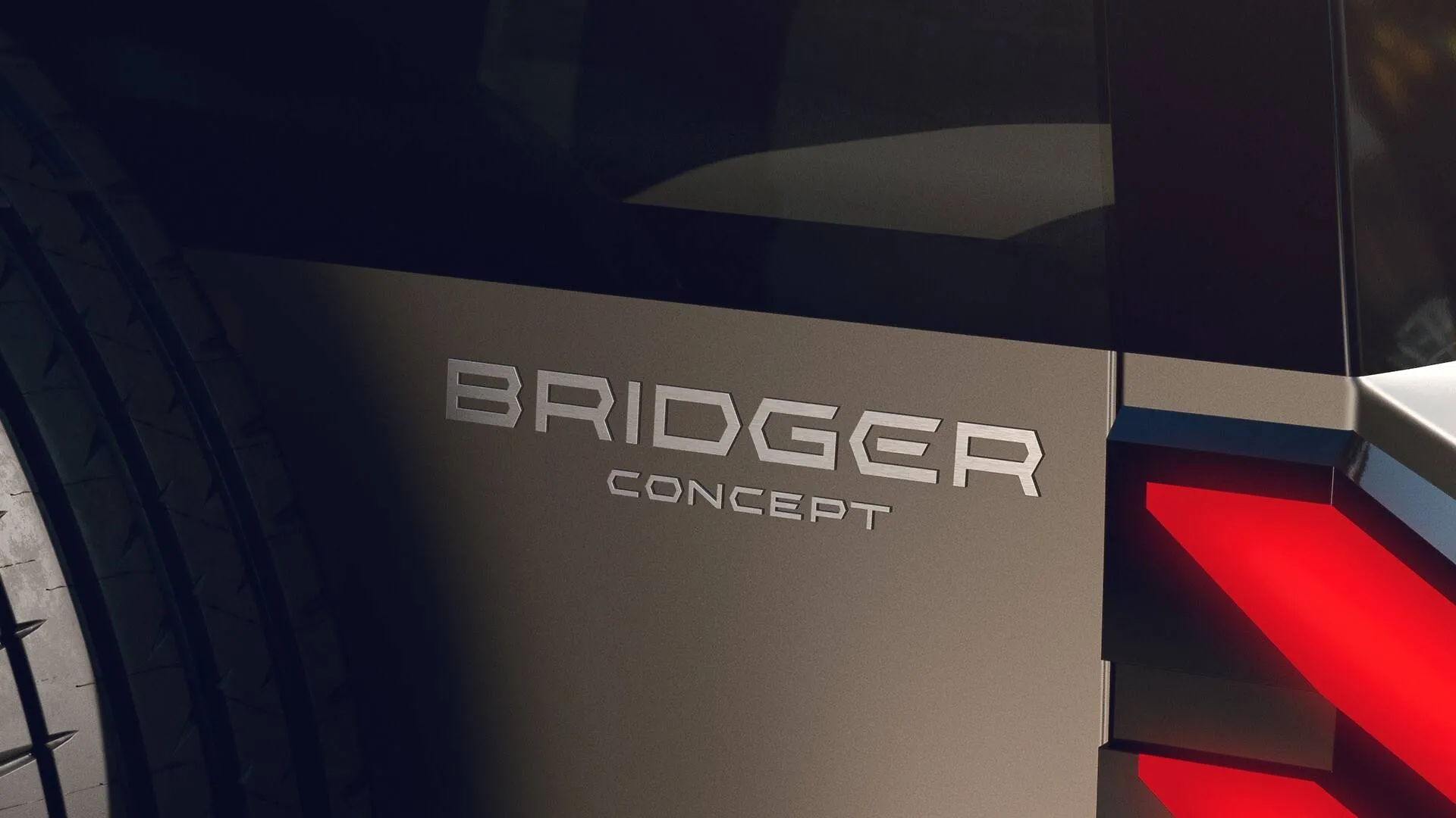 Show-car-Bridger-Concept dacia si vede il logo con la scritte bridger concept su sfondo marrone della carrozzeria