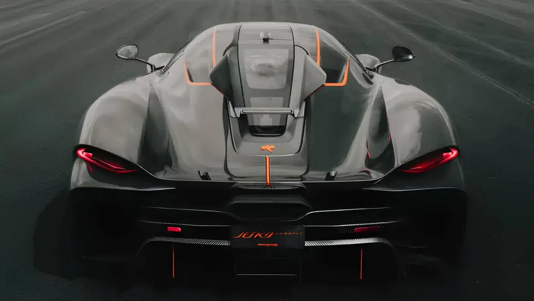 Nell'immagine si vede la Koenigsegg Jesko absolute vista da dietro