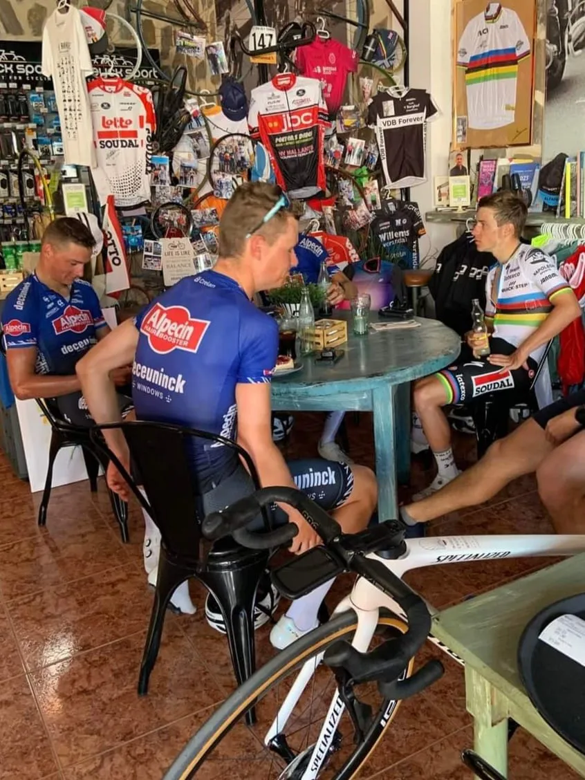 Mathieu van der Poel and Remco Evenepoel take a break from training to share a drink together