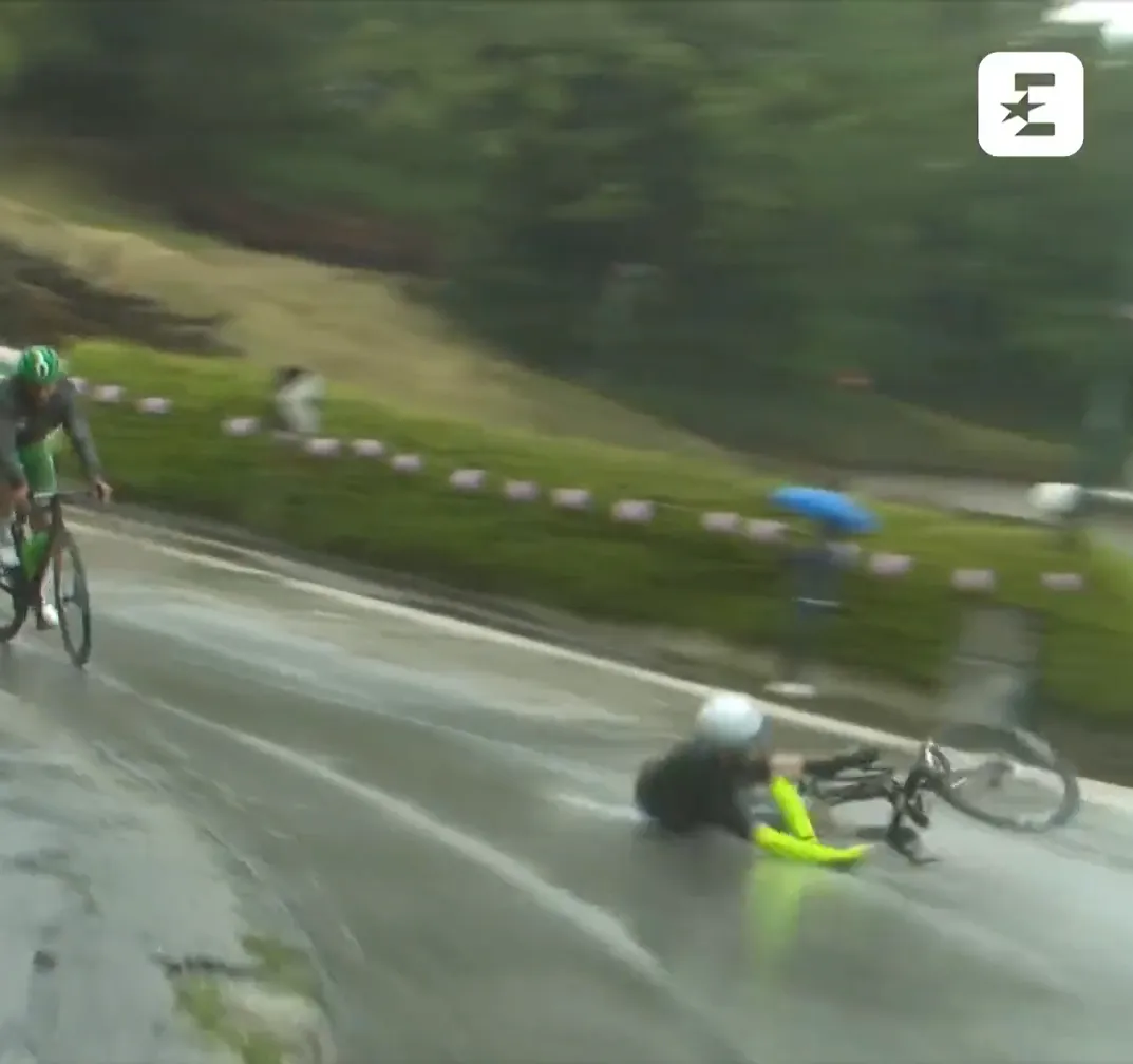 VIDEO: Two of the early breakaway go down as Pinot narrowly avoids disaster on treacherous wet roads at the Giro d'Italia