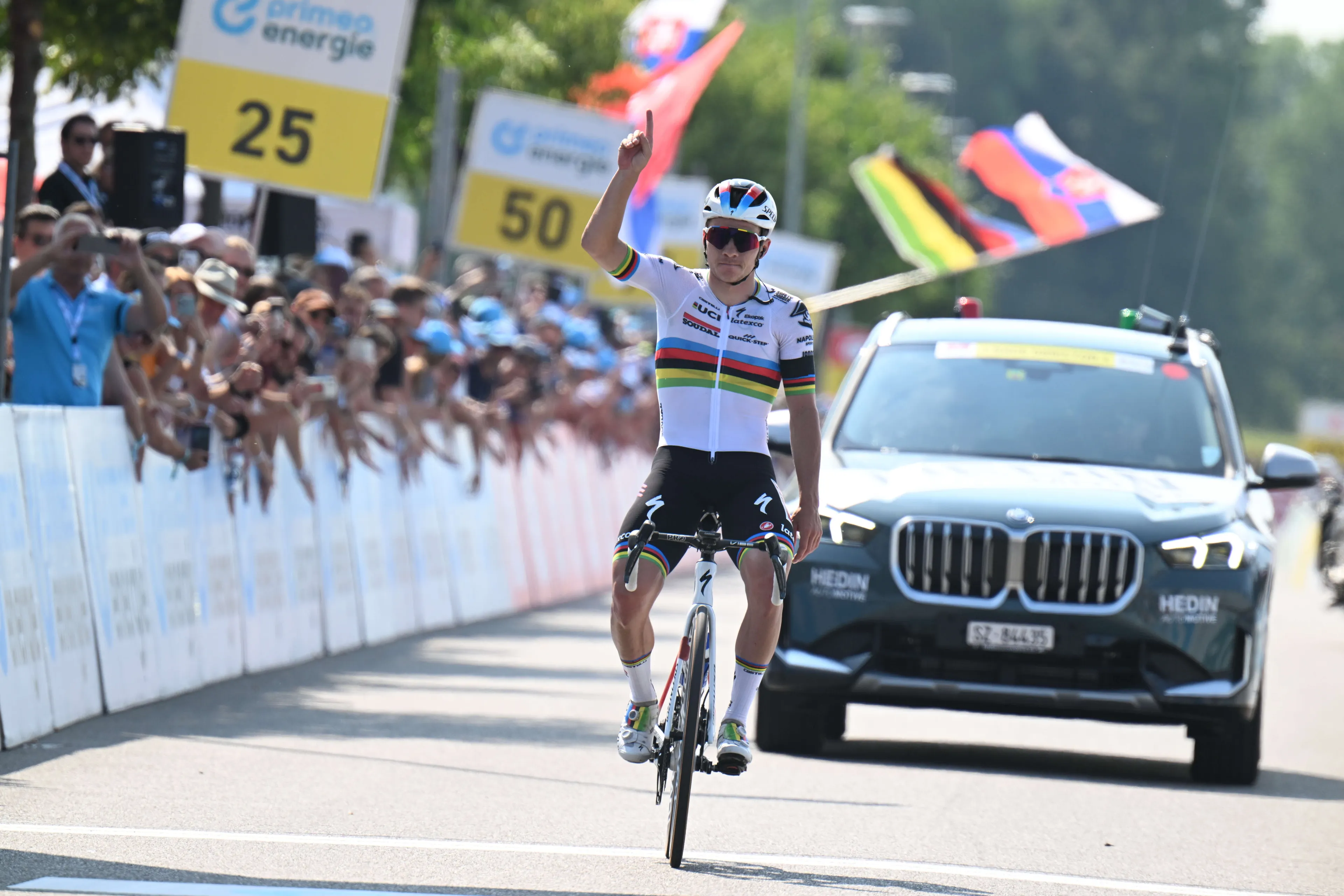 Remco Evenepoel solos to sombre victory on an emotional day at the Tour de Suisse