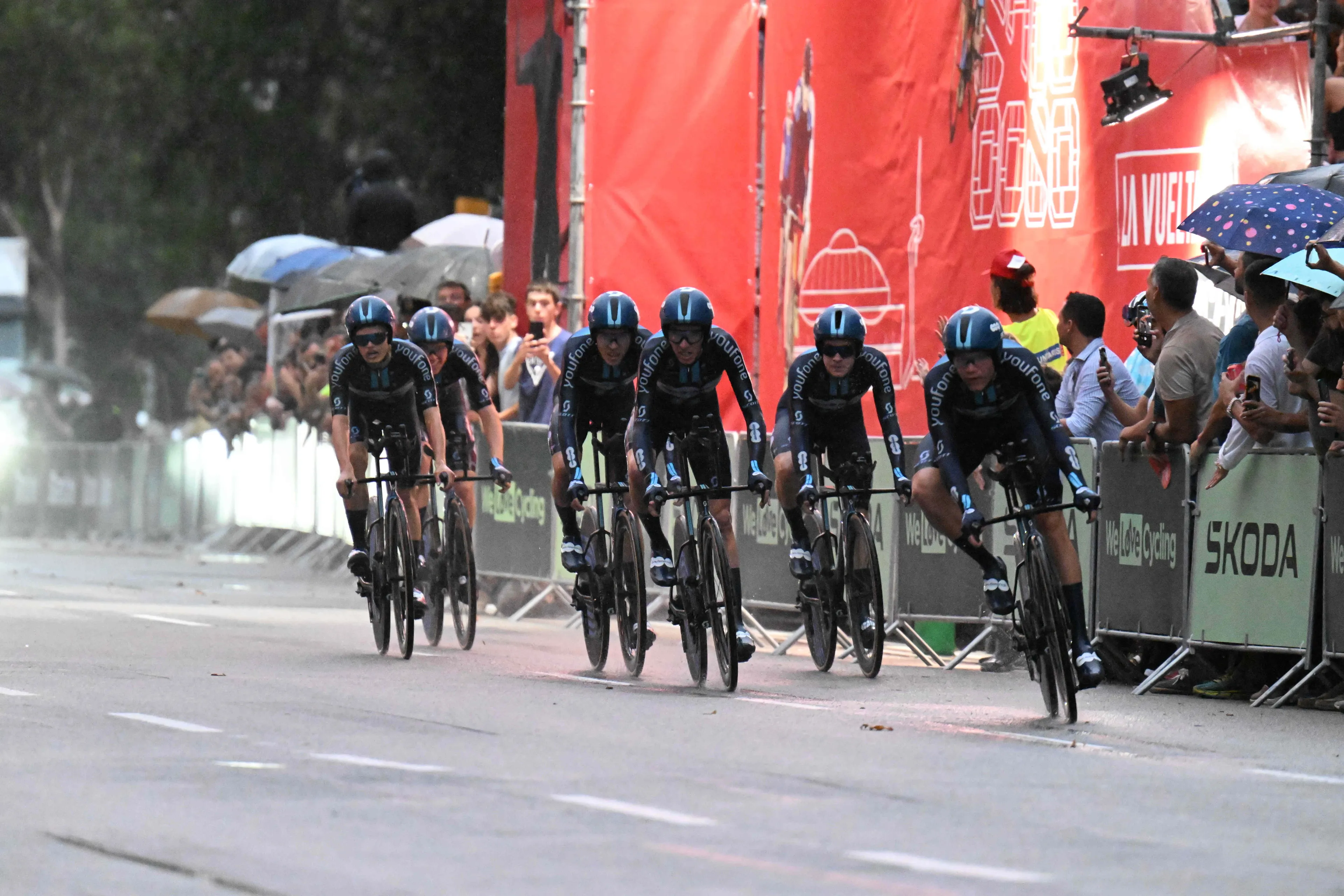 Team DSM-Firmenich wins Vuelta a Espana opening team time-trial in shock result following horrible weather and plenty crashes
