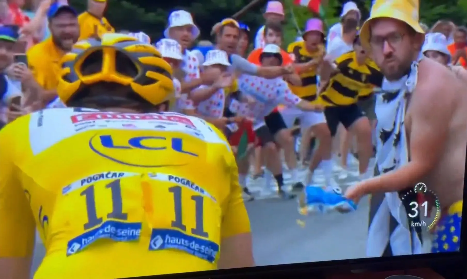VIDEO: Watch as idiot with crisp packet almost derails Tadej Pogacar's stage winning attack on stage 14 of Tour de France