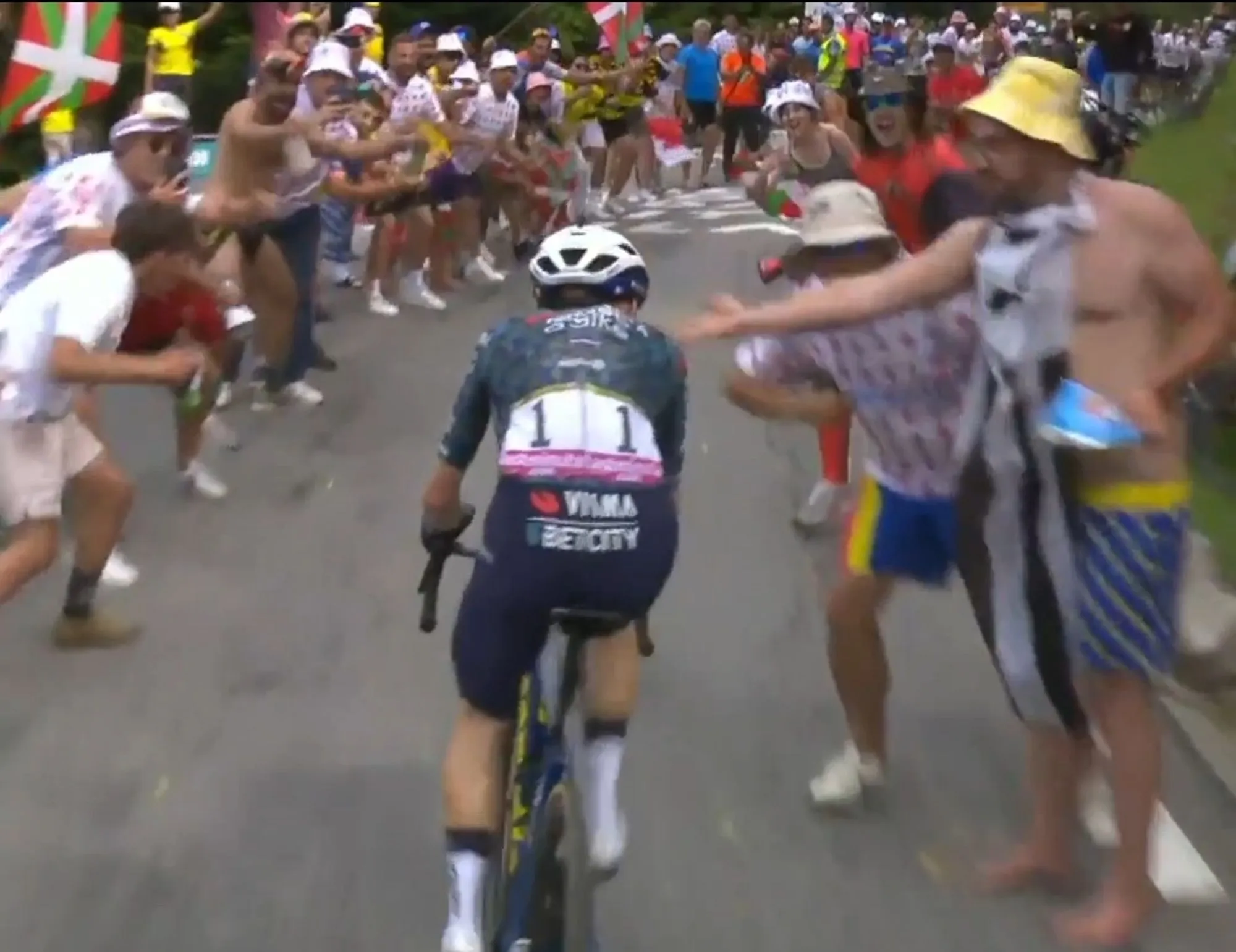 Tour de France crisp thrower released without charge after night in the cells