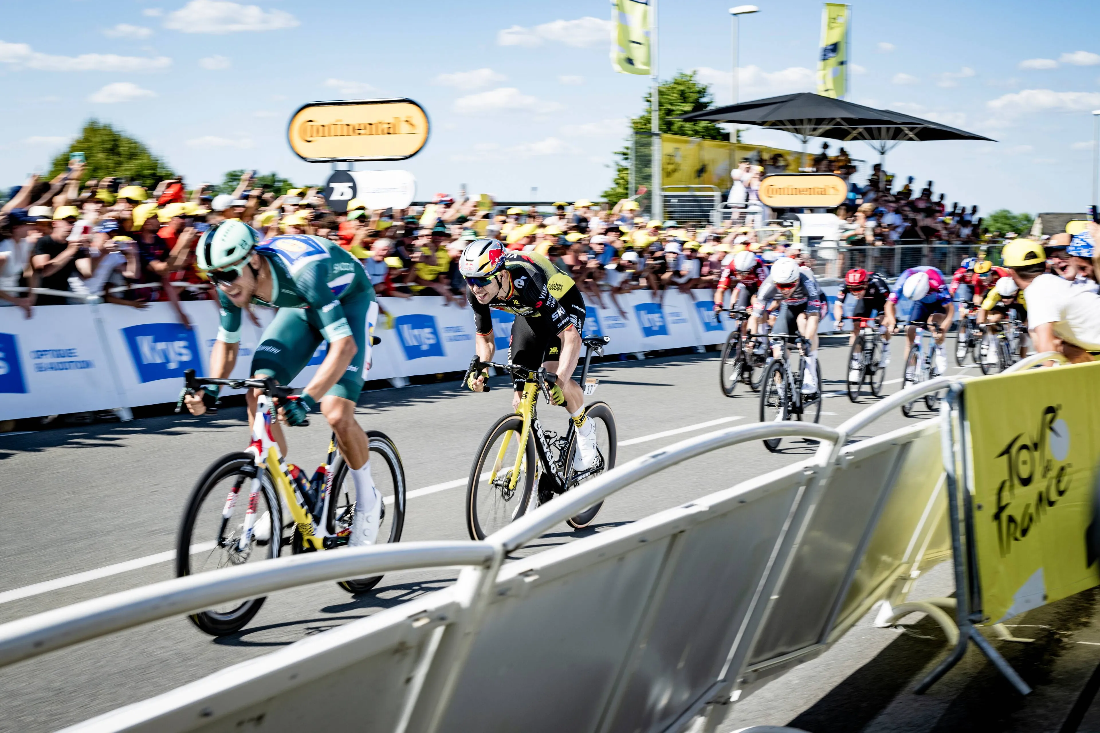 Wout van Aert and Jonathan Milan sprinting at the end of stage 8 of the 2025 Tour de France