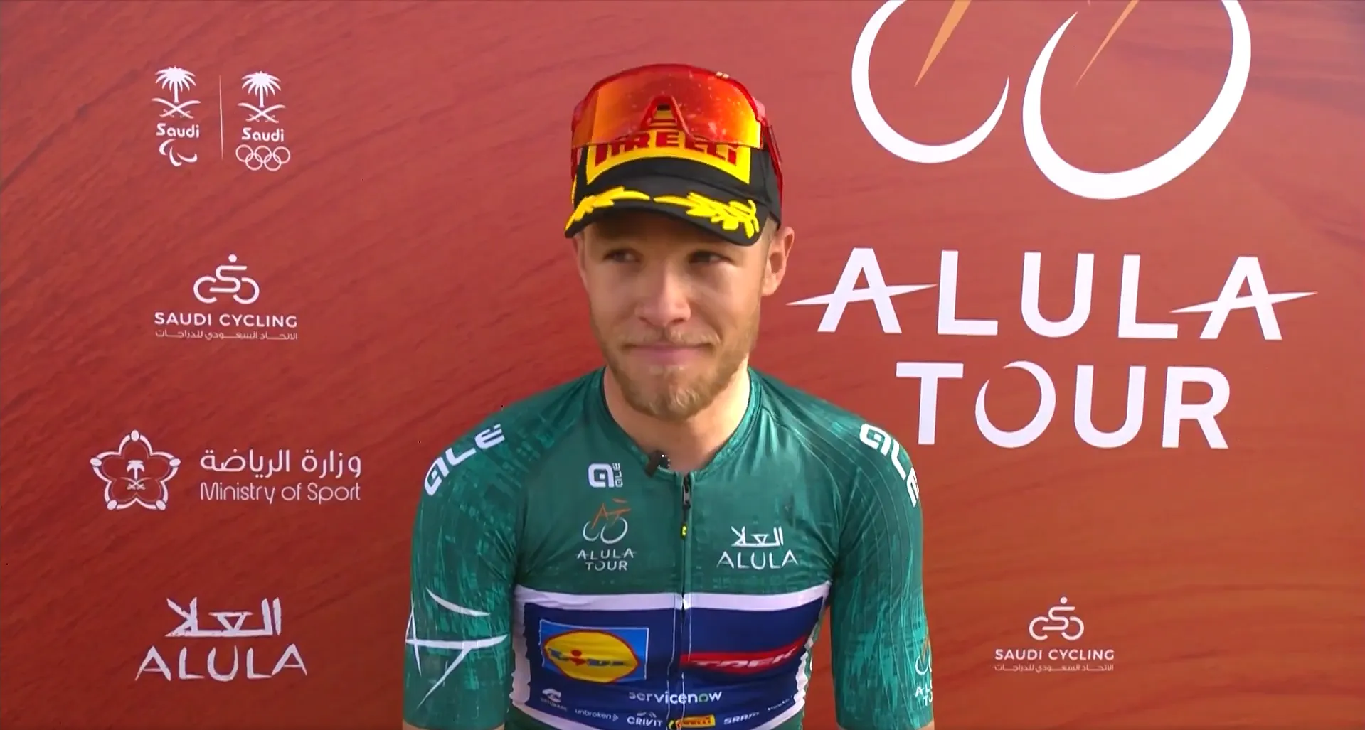 Jonathan Milan speaks to the media after winning stage 2 of the 2026 AlUla Tour