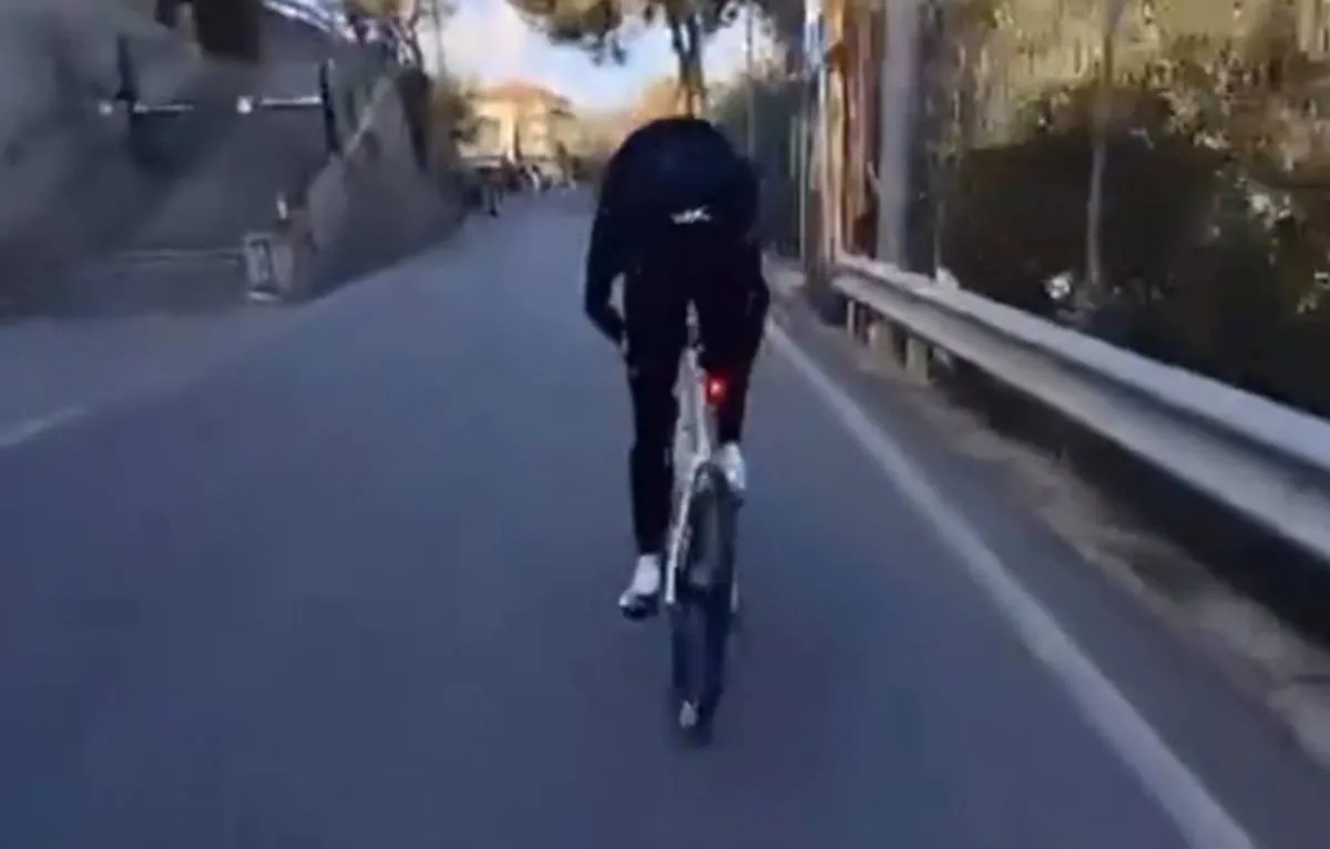 Tadej Pogacar sprinting up the Poggio as he prepares for Milano-Sanremo