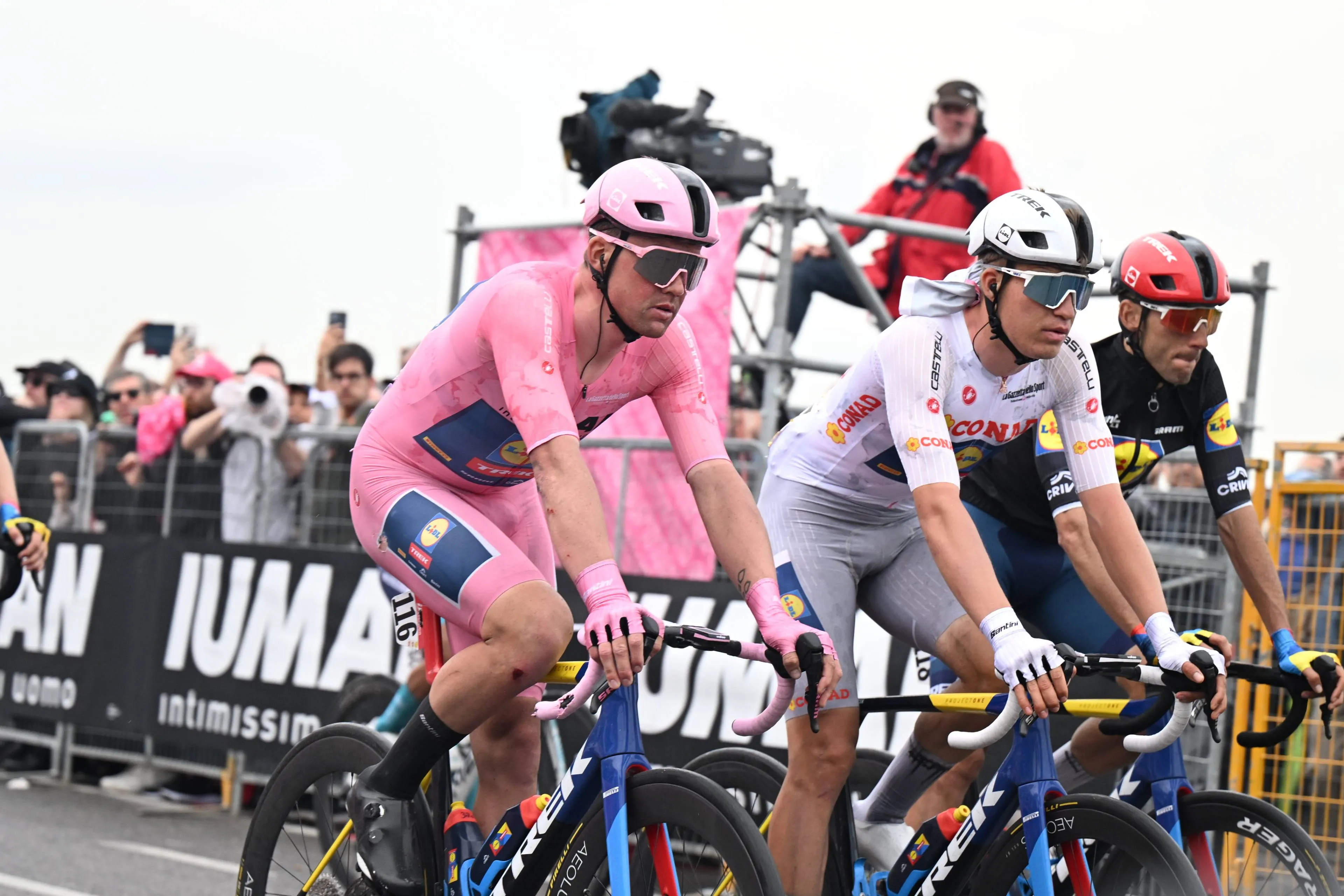 Mads Pedersen and Mathias Vacek ride alongside each other at the 2025 Giro d'Italia