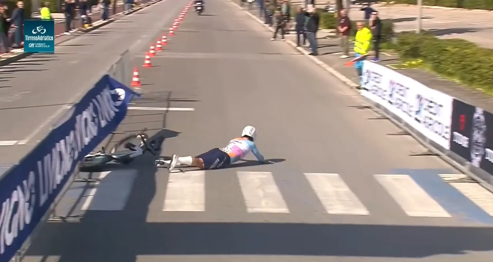 Oded Kogut slides out during his 2026 Tirreno-Adriatico stage 1 time trial