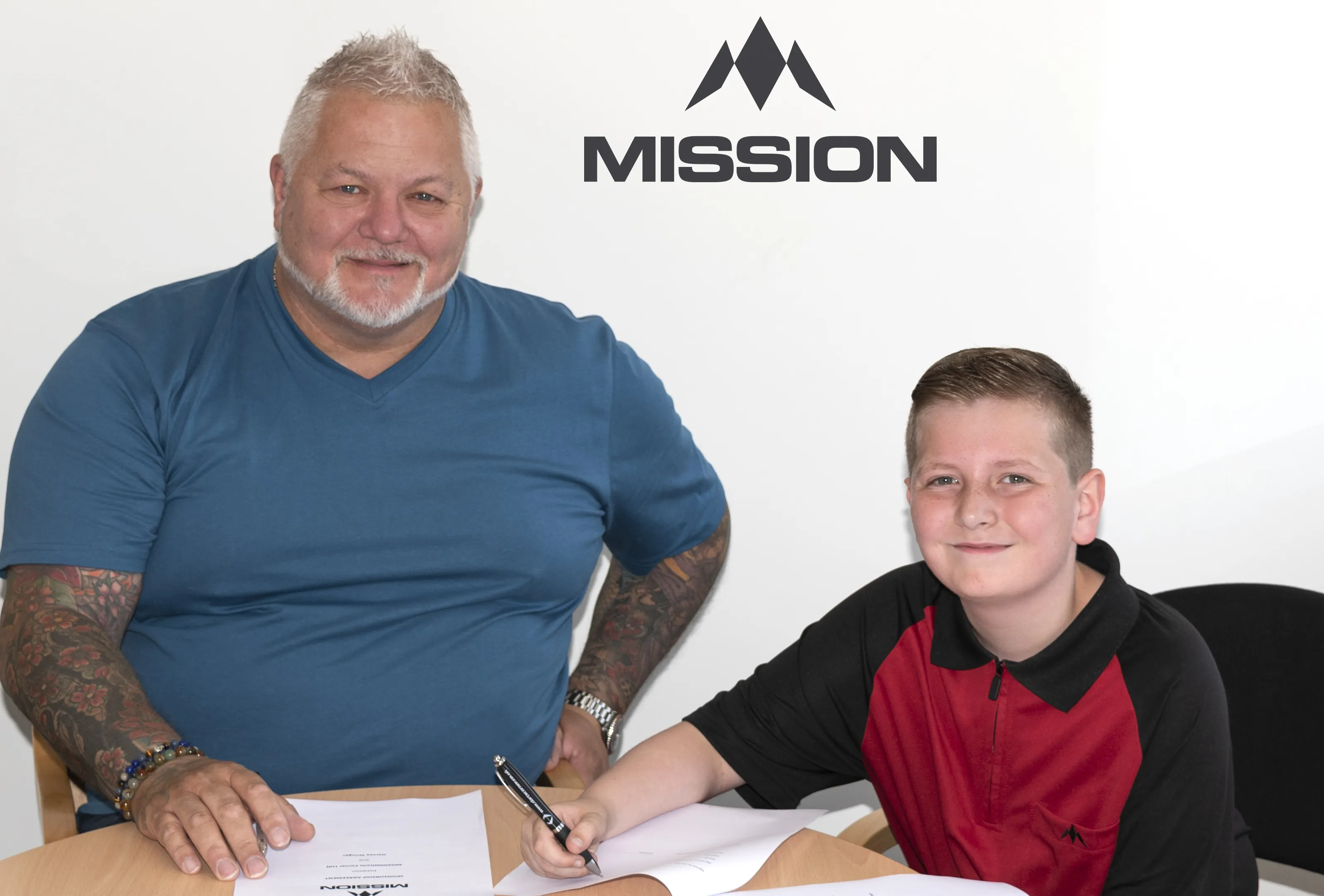 One of the youngest players to hit nine-dart finish signs with Mission Darts