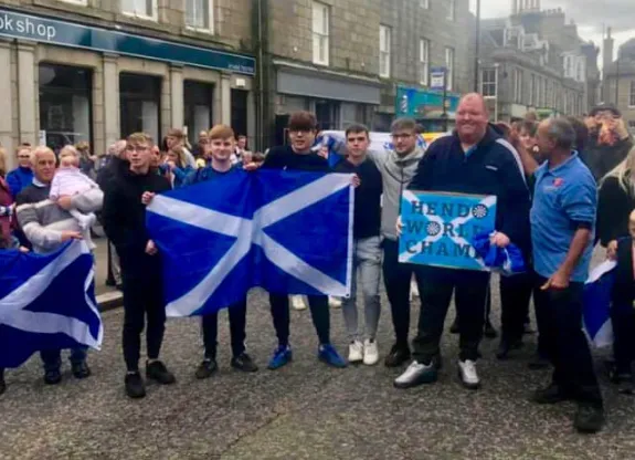 VIDEO: Henderson receives homecoming after World Cup of Darts win