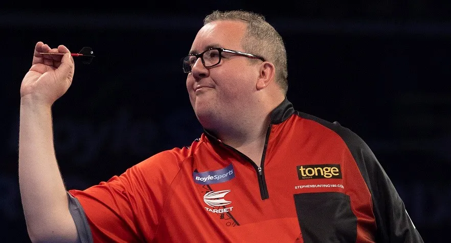 Bunting continues fine form with victory over Wade to book World Grand Prix Quarter-Final spot