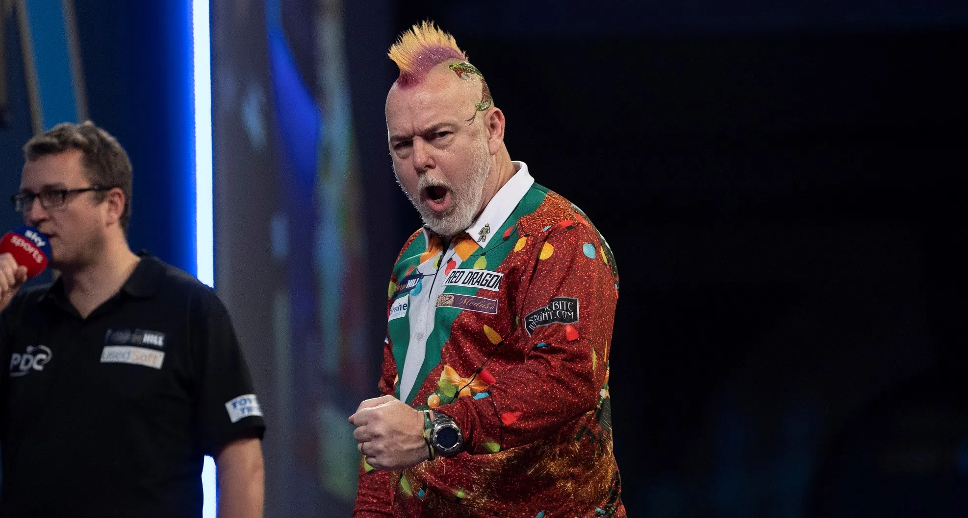 Wright reels off four sets in a row to complete comeback win over Heta at PDC World Darts Championship